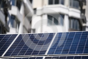 The solar battery panel mounted near modern apartment building in Kyiv, Ukraine