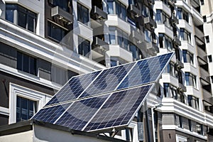 The solar battery panel mounted near modern apartment building in Kyiv, Ukraine