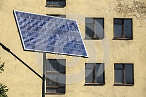 The solar battery panels mounted on the balcony of an apartment building