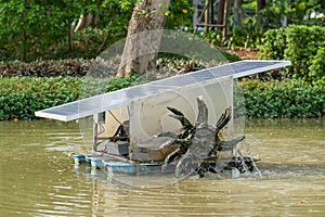 Solar Cell Panel Paddle Wheel Aerator in city park pond