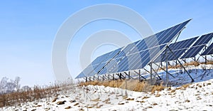 Solar cells Photoelectric cells on a bright, sunny, frosty winter day in the countryside. photo