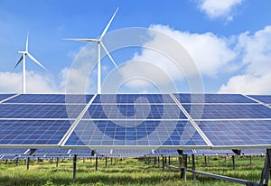 Solar cells with wind turbines generating electricity alternative renewable clean energy