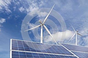 Solar cells with wind turbines in hybrid power plant systems station on blue sky background
