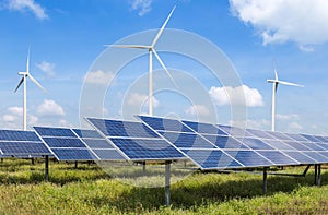 Solar cells and wind turbines in power station alternative renewable energy from nature photo