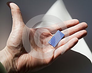 Solar chip in palm