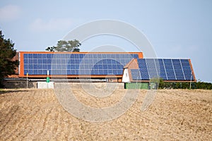 Solar collectors on house photo