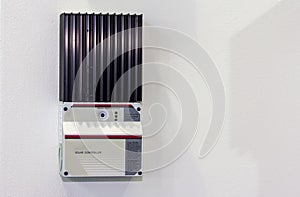 Solar Controller equipment for electric charge of solar energy industrial on white wall with copy space