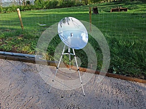 Solar Cooking converted satellite dish Parabolic mirror dish on a stand for solar cooking