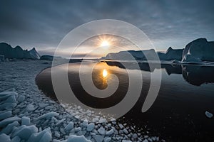 solar eclipse in the arctic, casting a dark sculptured landscape