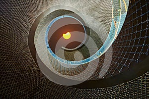 Solar eclipse seen from spiral stair