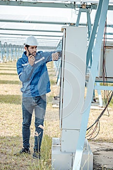 Solar electric installer and practitioner inspect electrical systems for appropriate wiring, polarity, grounding, and termination