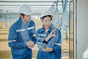 Solar electric installer and practitioner inspect electrical systems for appropriate wiring, polarity, grounding, and termination