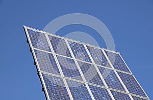 Solar energy cell panel over blue sky background