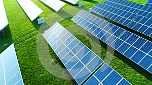 Solar energy farm in a field. High angle view of solar panels on an energy farm.