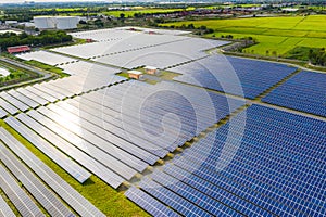 Solar energy farm producing clean renewable energy from the sun . Thousands of solar panels, Photovoltaic solar cells , huge solar