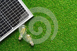 Solar energy panel and light bulb, green energy