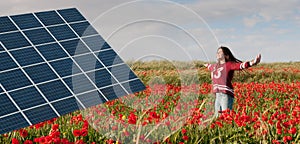 Solar energy panel and teenage girl on a field with red poppies.