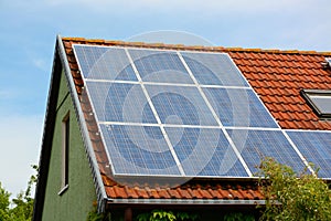 Solar energy panels on roof of house