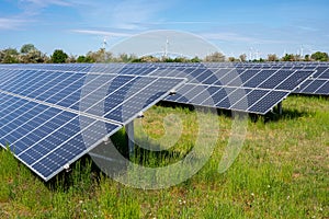 Solar energy panels with wind turbines