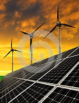 Solar energy panels with wind turbines