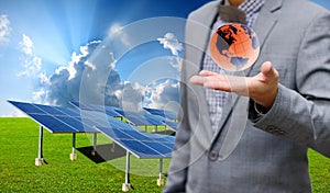 Solar farm with businessman carry virtual world