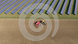 A Solar Farm and Traditional Farming Side By Side