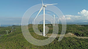 Solar farm with windmills. Philippines, Luzon