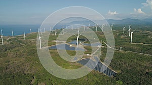 Solar Farm with Windmills. Philippines, Luzon