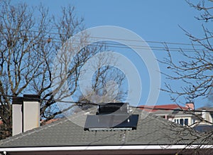 solar heater on the house roof in sunny cold winter day