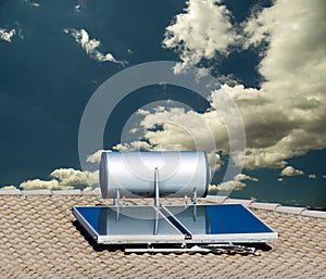 Solar heater panels on the roof alternative energy sky and  clouds