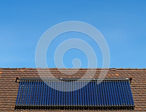 Solar heating - solar thermic panel on a tiled roof