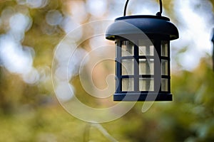 Solar lantern hanging in the summer day