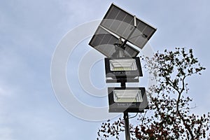 Solar lights installed outdoors, ready to use at night photo