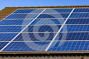 Solar modules of a photovoltaic system on a house to generate sustainable energy