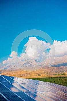 Solar panel on the background of mountains. sustainable development of new energy in agriculture