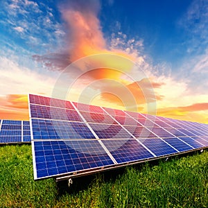 Solar panel on beautiful orange sundown background