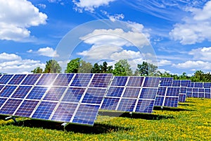 Solar panel on blue sky background. Solar panel against blue sky background. Photovoltaic, alternative electricity source. Idea
