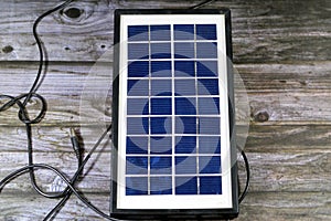 A solar panel, a device that converts sunlight into electricity by using photovoltaic (PV) cells which made of materials