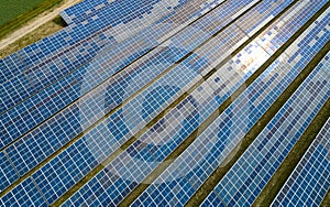 solar panel field at work with sun reflection