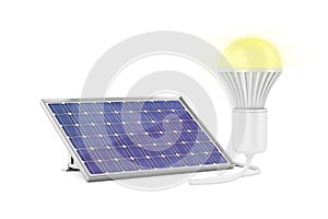 Solar panel and glowing light bulb