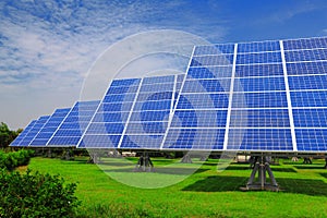 Solar Panel with green grass and beautiful blue sk photo