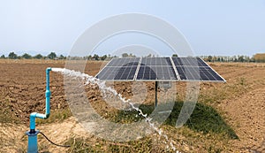 Solar panel for groundwater pump in agricultural field during drought by El Nino phenomenon photo