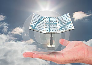 solar panel on hand in the sky