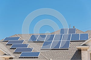 Solar panel installation on asphalt shingles rooftop