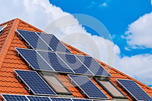 solar panel on modern tiled red roof