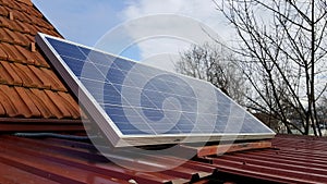 Solar panel mounted on metal roof