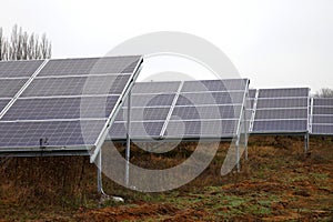 Solar panel. Solar panels installed in a rural area. Solar power plant in a field.