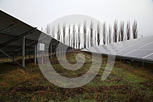 Solar panel. Solar panels installed in a rural area. Solar power plant in a field. Solar panel produces green, environmentally