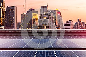 Solar Panel Photovoltaic installation on a Roof of factory, sunny blue sky background, alternative electricity source -