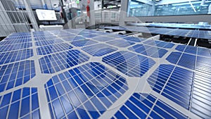 Solar panel placed on conveyor belt, operated by industrial robot arm, 3D illustration